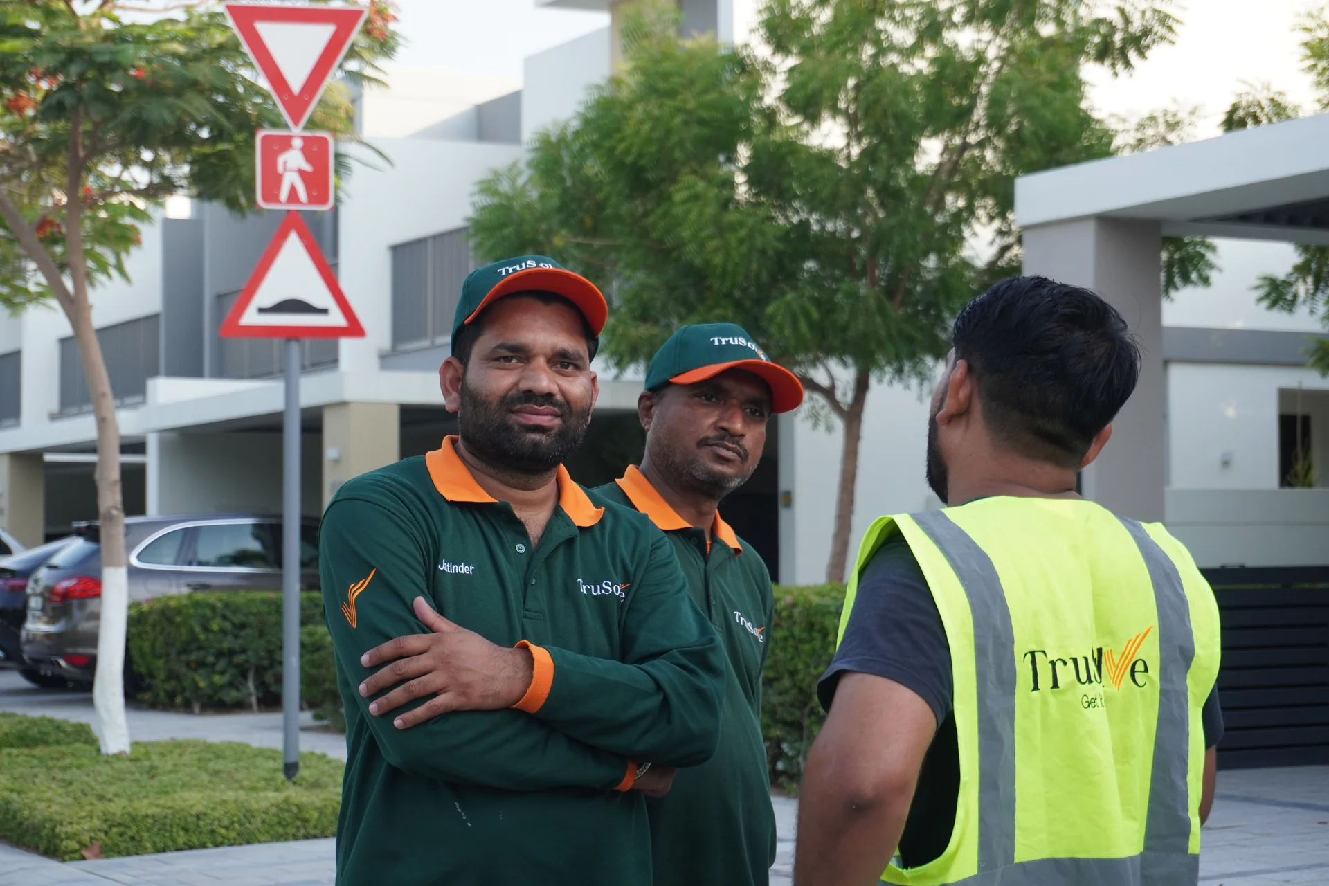 TruSolve technical team coordinating work outside Dubai villas