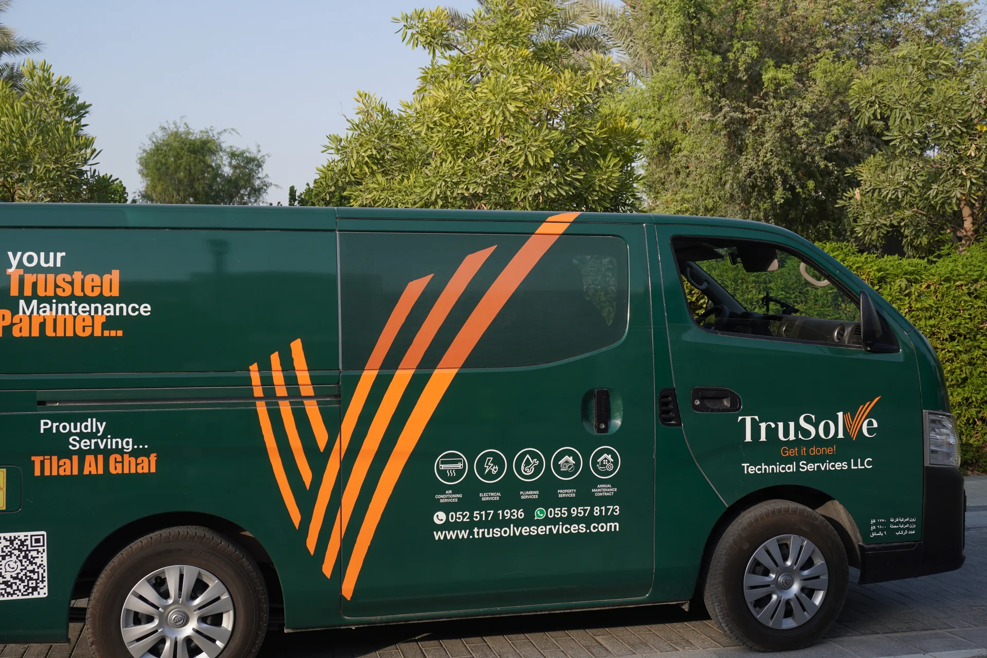 Side view of the TruSolve service van dedicated to Tilal Al Ghaf maintenance